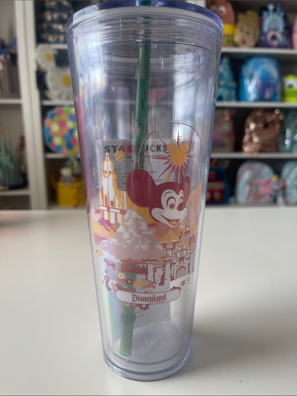 Starbucks Pink and Gold Disneyland Clear Tumbler with Green Straw